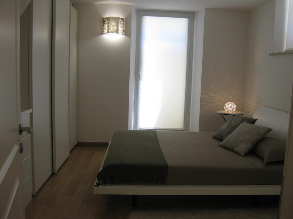 Appartamento In Villa Pésaro Habitación foto