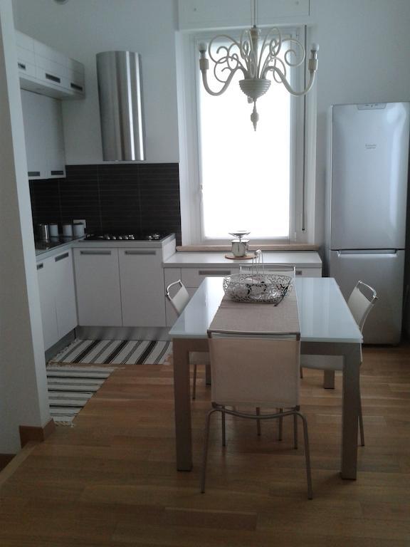 Appartamento In Villa Pésaro Habitación foto
